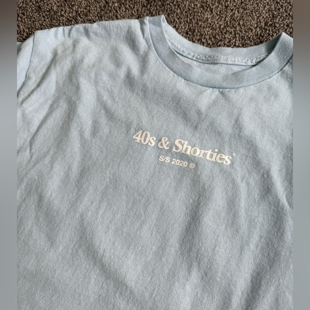 light blue graphic tee